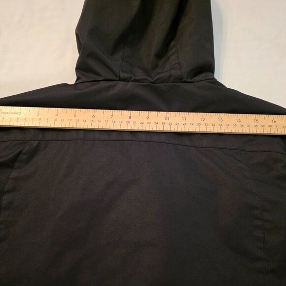 Beautiful slightly used Izod women's black ski jacket with teal accent. Size L. - Picture 12 of 12